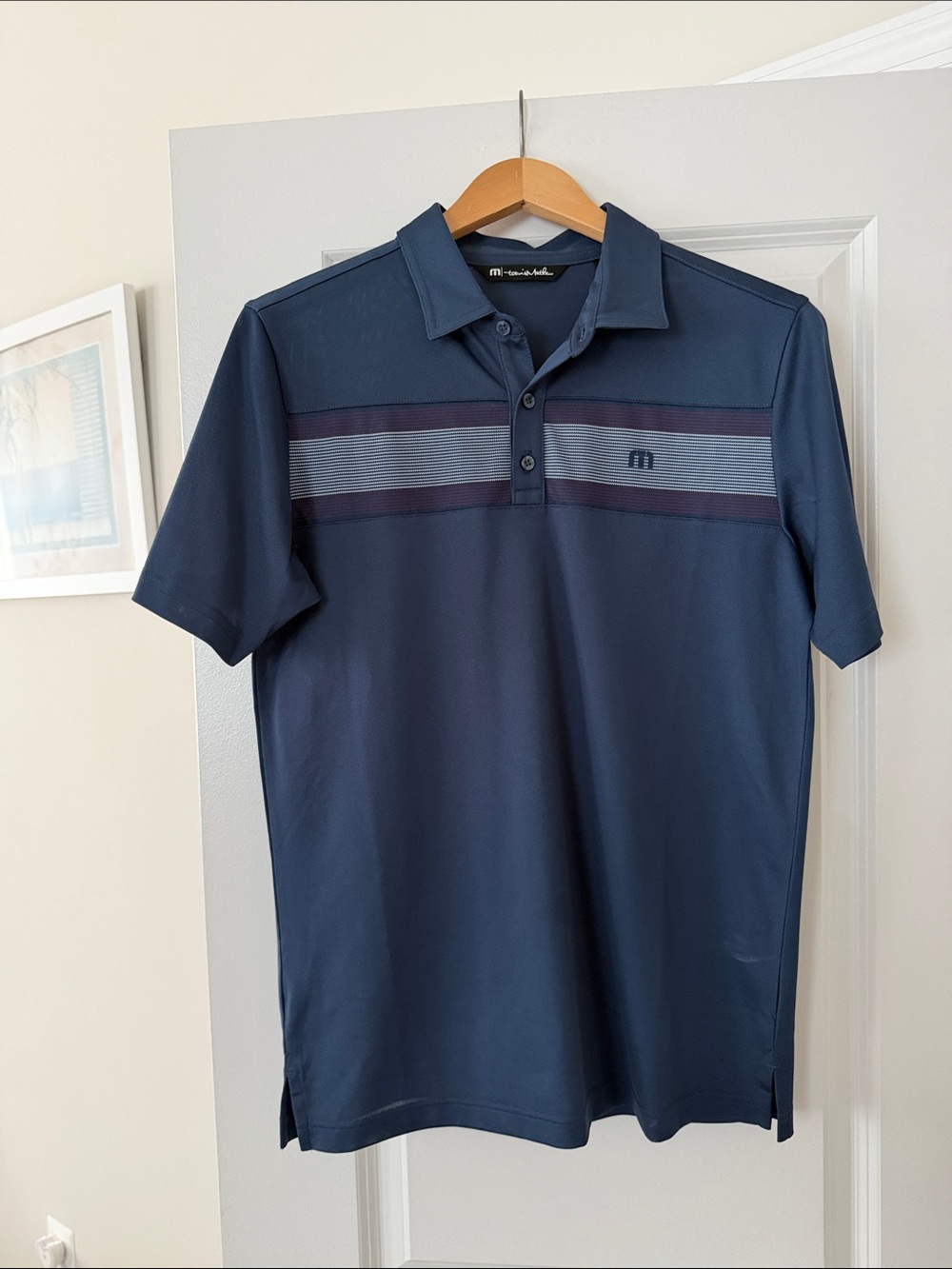 Travis Mathew Navy Polo with Subtle Chest Stripes Men’s